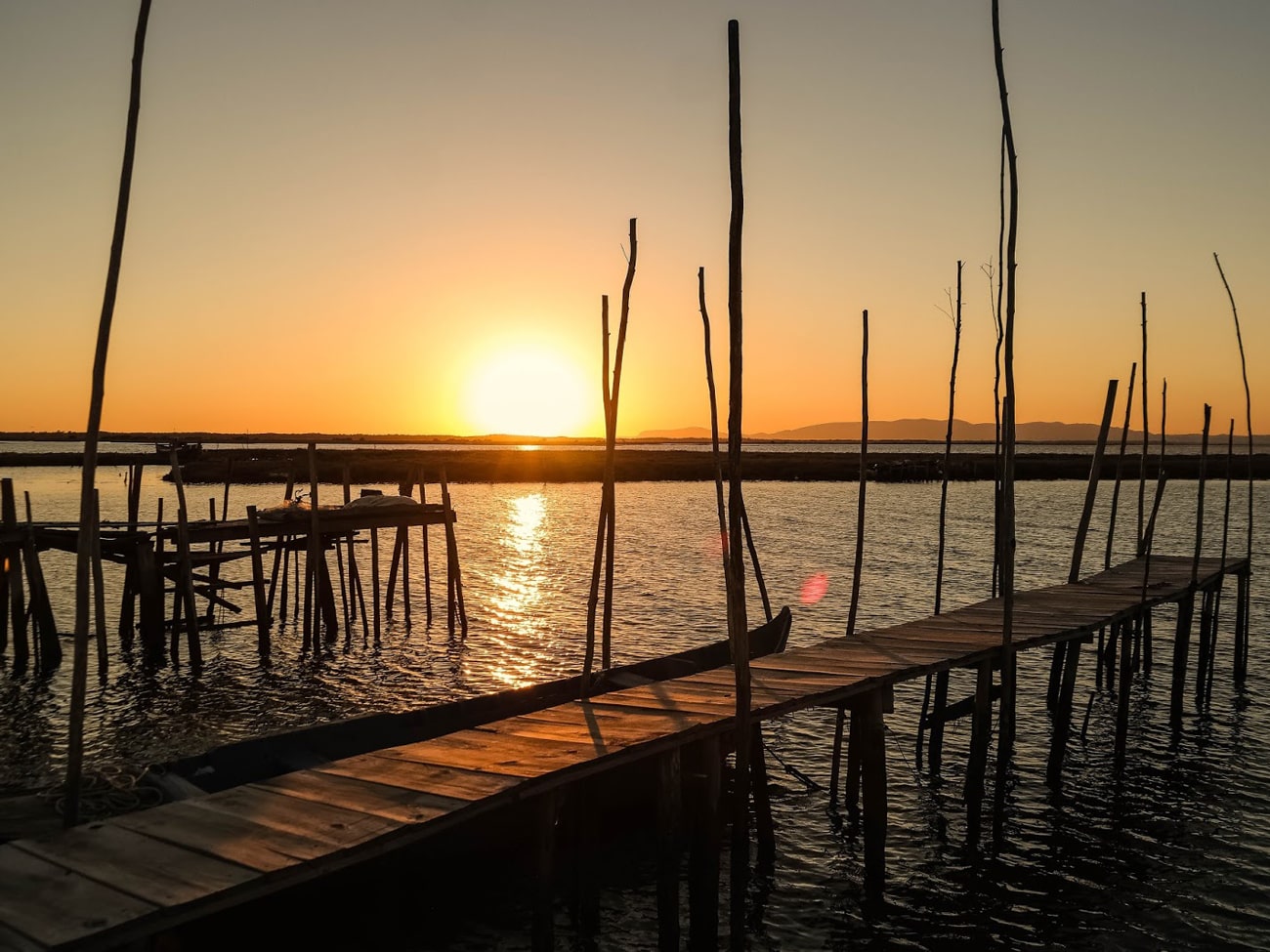 Cais Palafítico da Carrasqueira pôr do sol